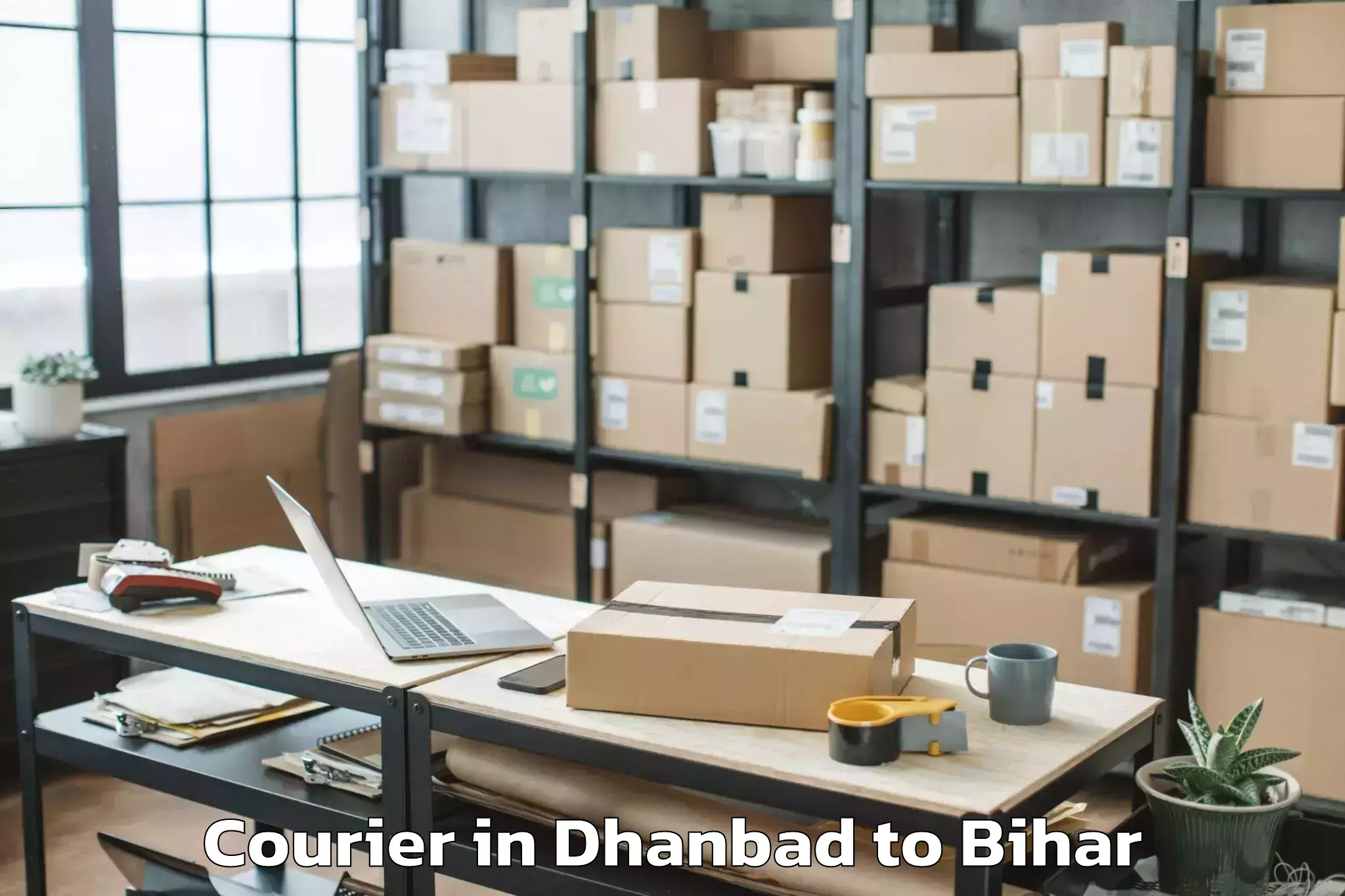 Book Dhanbad to Tetaria Courier Online